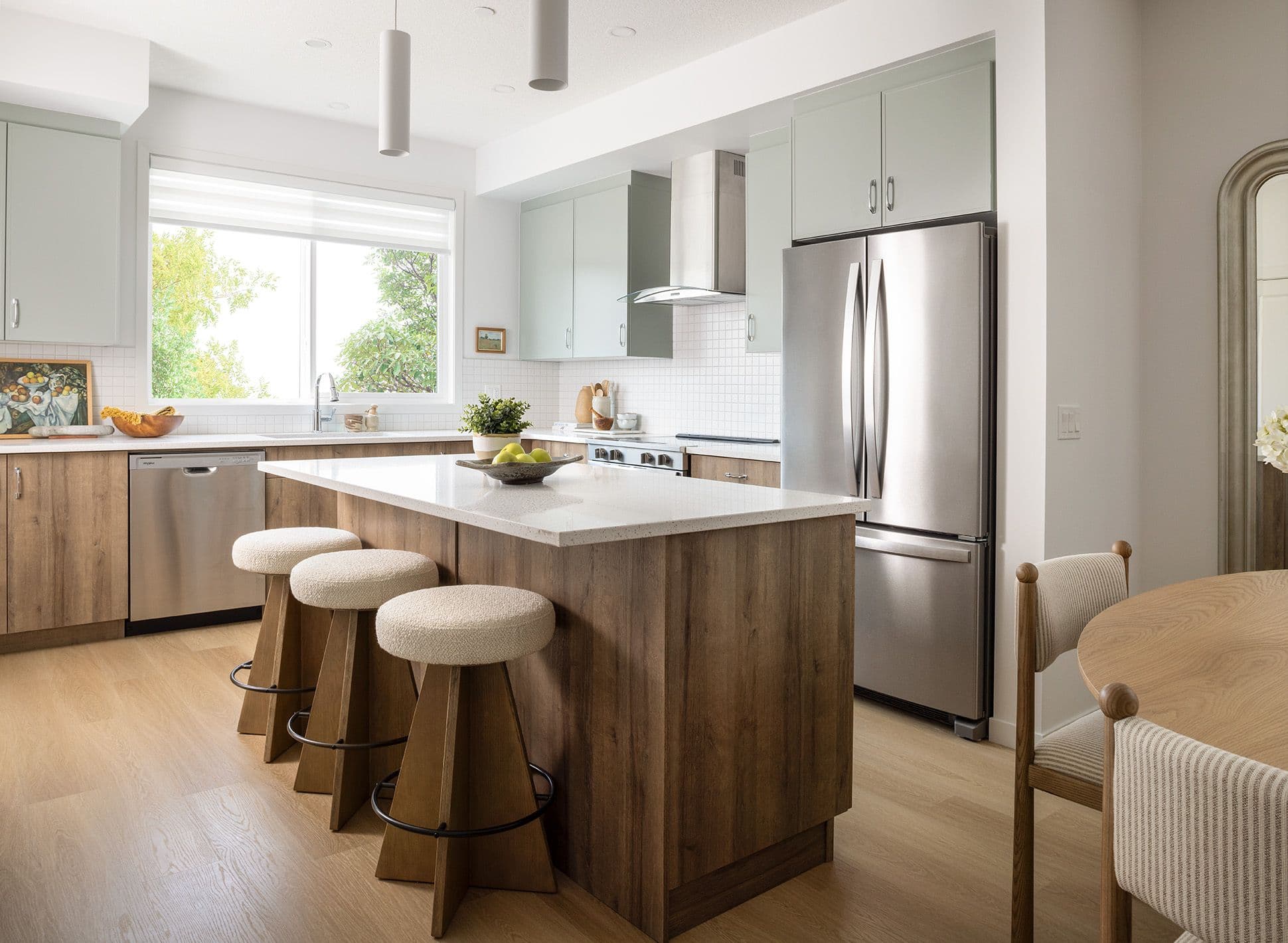 Barwell kitchen with pale green cabinets.
